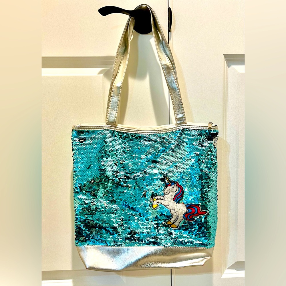 NWOT. Girls (reverse) sequin unicorn bag. 12x12. New, never used. Zip top.